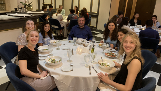 Sanford Professor Abdullah Antepli and students at the TI welcome dinner.
