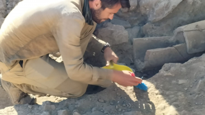 Antonio carefully exacting an ancient pipe system at Vulci
