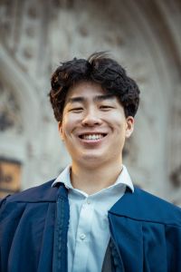 young asian man smiling