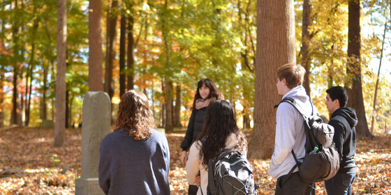 Students analyze with Prof. Jiménez different types of monuments at Geer Cemetery (photo Danielle Vander Horst)