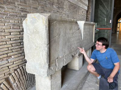 Ben examining an epitaphic inscription from the Capitoline museum.