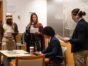 Students dressed up as religious leaders and Duke professors for a classroom performance 