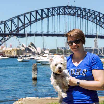Elizabeth Rudisill with dog at bridge